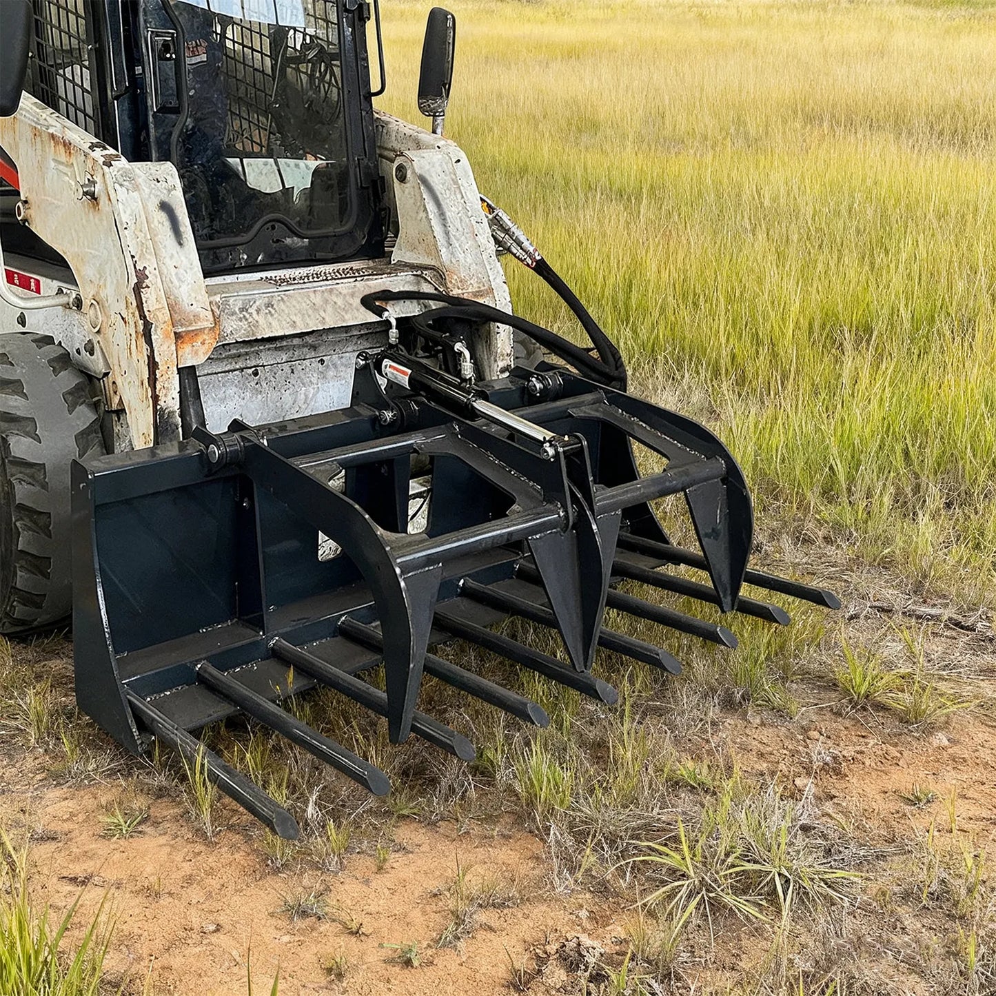 skid_steer_compact tractor manure fork grapple_actual photo