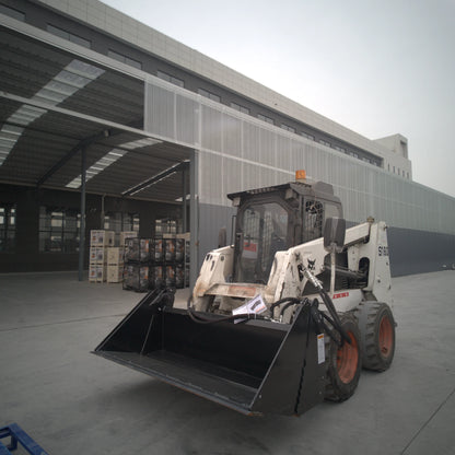 skid_steer_4-in-1_bucket_in_use_01