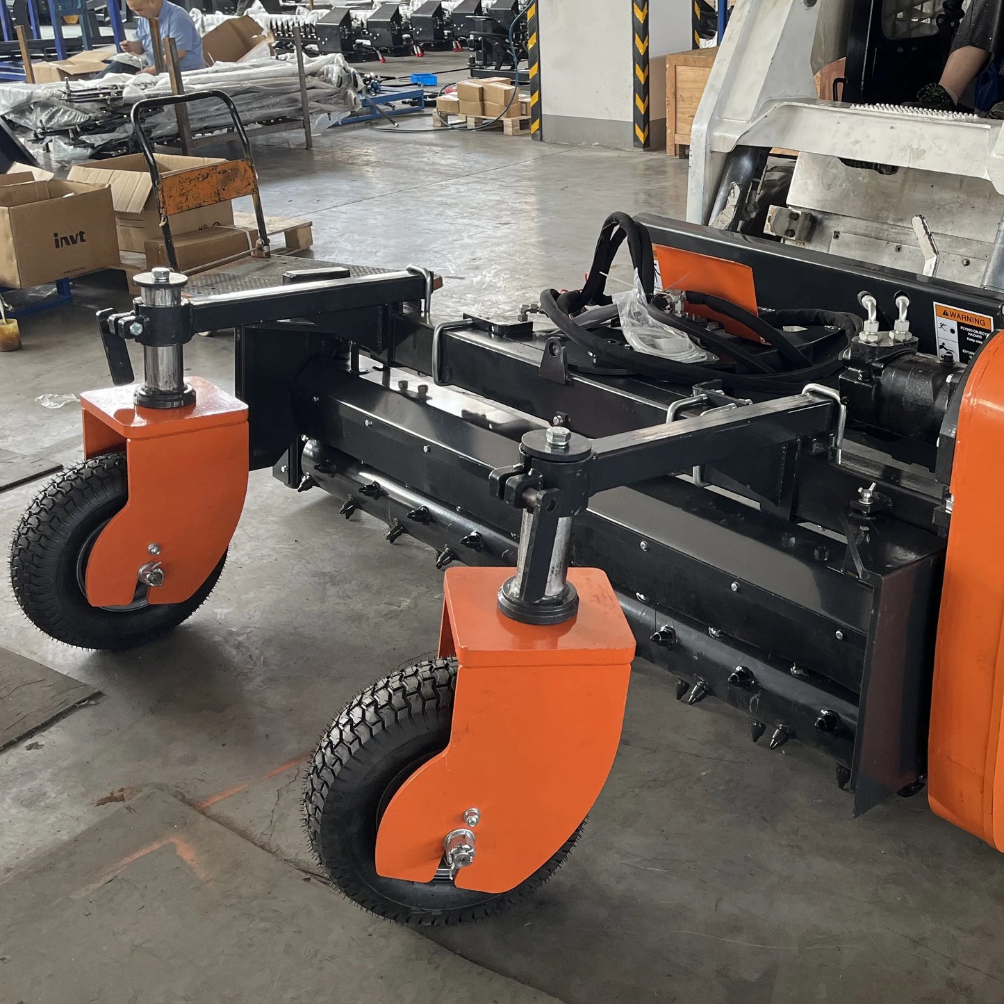 skid_steer_power_rake_side_angle_workshop_display